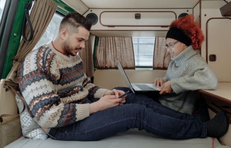 writing at a camper van