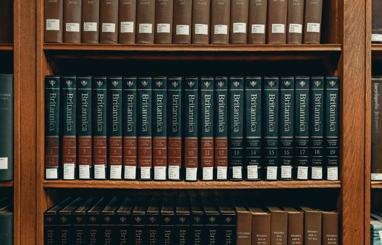 books on wooden shelf