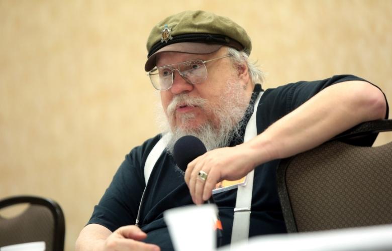 george r. r. martin speaking with attendees at the 43rd annual tuscon