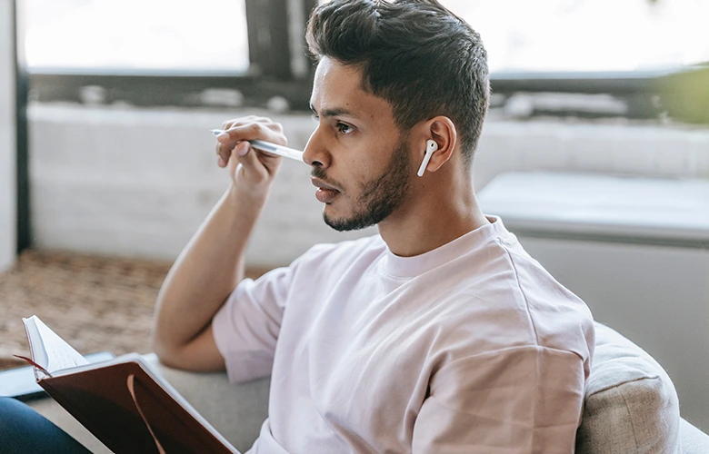 listening to a recorded lecture while taking notes